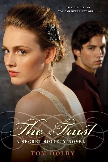 The Trust, Tom Dolby